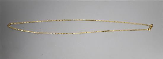 A yellow metal long bar link fine chain, possibly Middle Eastern (tests as 18ct gold), 8.7g